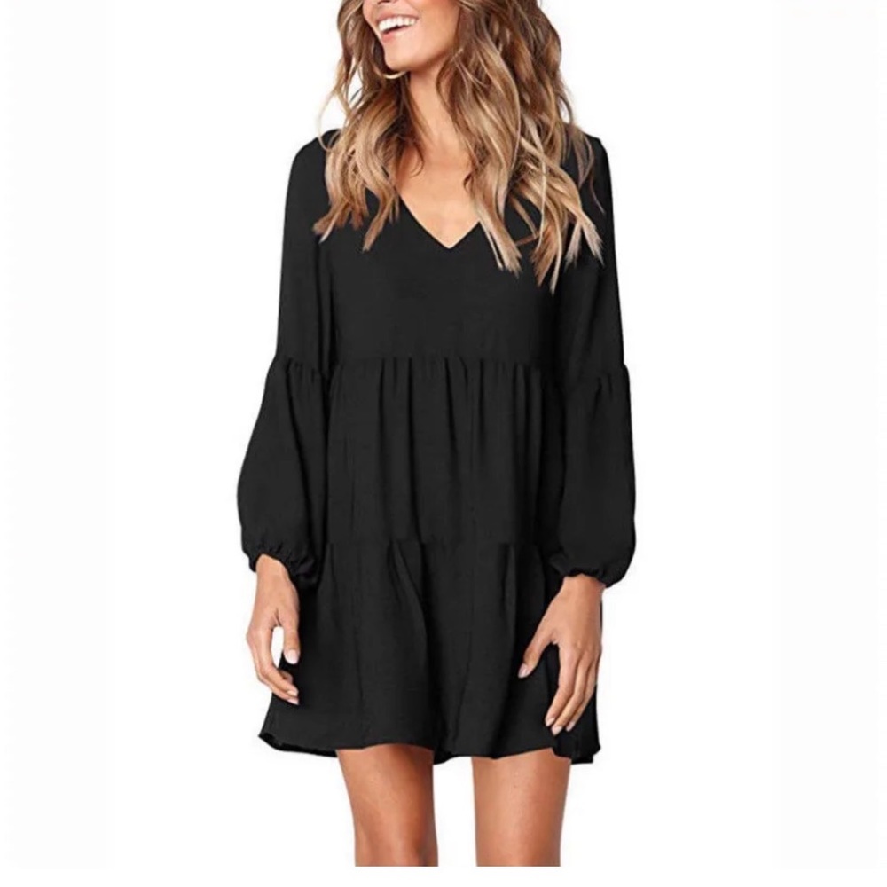 BLACK ruffle tiered dress with long sleeves.